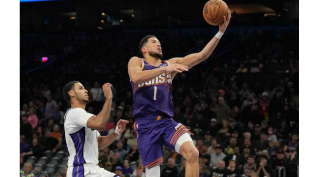 Booker erzielt 20 Tore im ersten Viertel, endet mit 33 als Suns Kings 129-102 besiegt