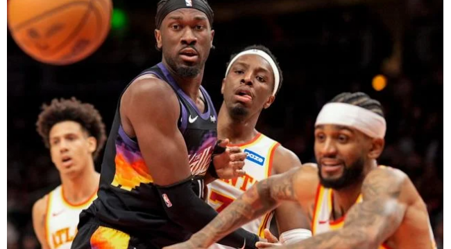 Hawks Rallye zu schlagen Suns 110-103 nach Phoenix verliert Devin Booker zu Verletzung